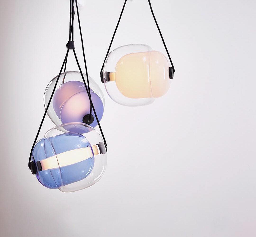 modern-capsula-layered-glass-led-pendant-light-for-contemporary-interior-lighting