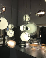 modern-capsula-layered-glass-led-pendant-light-for-contemporary-interior-lighting
