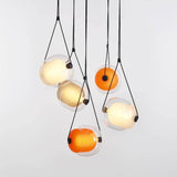 modern-capsula-layered-glass-led-pendant-light-for-contemporary-interior-lighting
