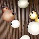 modern-capsula-layered-glass-led-pendant-light-for-contemporary-interior-lighting