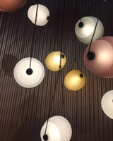 modern-capsula-layered-glass-led-pendant-light-for-contemporary-interior-lighting