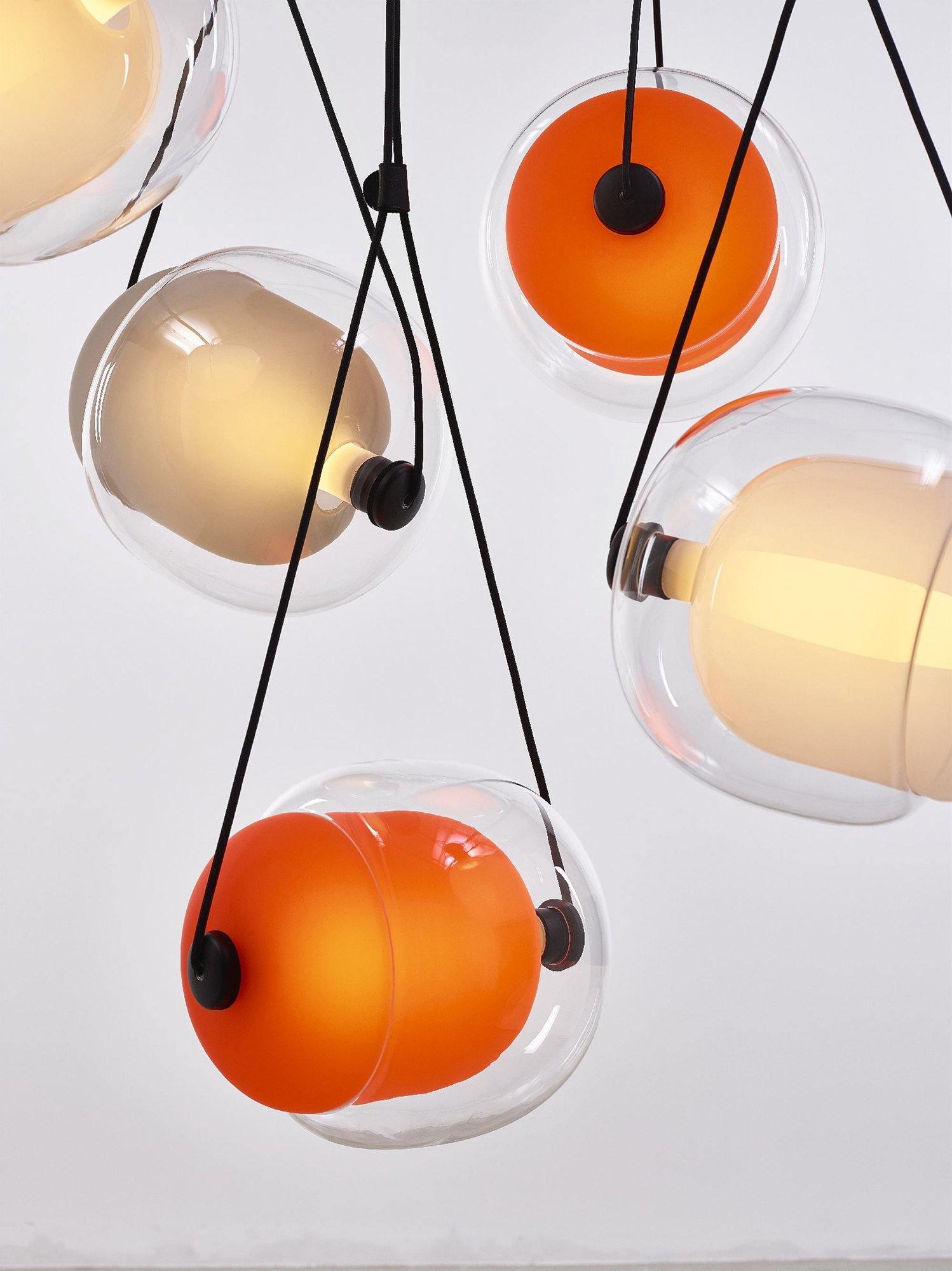 modern-capsula-layered-glass-led-pendant-light-for-contemporary-interior-lighting