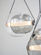 modern-capsula-layered-glass-led-pendant-light-for-contemporary-interior-lighting