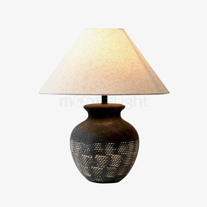 rustic-carved-ceramic-table-lamp-with-white-linen-drum-shade-and-handcrafted-earth-toned-finish