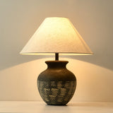 rustic-carved-ceramic-table-lamp-with-white-linen-drum-shade-and-handcrafted-earth-toned-finish
