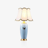 Elegant Blue Ceramic Oval Table Lamp with White Shantung Silk Shade for Modern Interiors