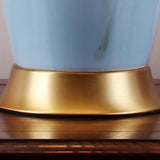 Elegant Blue Ceramic Oval Table Lamp with White Shantung Silk Shade for Modern Interiors