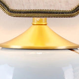 Elegant Blue Ceramic Oval Table Lamp with White Shantung Silk Shade for Modern Interiors