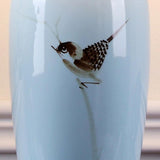 Elegant Blue Ceramic Oval Table Lamp with White Shantung Silk Shade for Modern Interiors