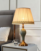 elegant-ceramic-and-brass-table-lamp-with-beige-fabric-shade-for-living-room