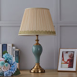 elegant-ceramic-and-brass-table-lamp-with-beige-fabric-shade-for-living-room