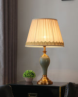elegant-ceramic-and-brass-table-lamp-with-beige-fabric-shade-for-living-room