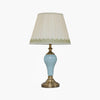 elegant-ceramic-and-brass-table-lamp-with-beige-fabric-shade-for-living-room