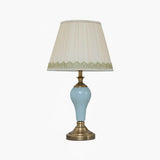 elegant-ceramic-and-brass-table-lamp-with-beige-fabric-shade-for-living-room