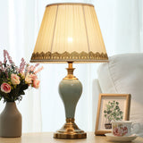 elegant-ceramic-and-brass-table-lamp-with-beige-fabric-shade-for-living-room