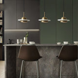 modern-gold-led-pendant-light-with-marble-accents-and-elegant-metal-disc-design