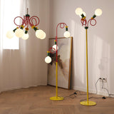 Retro Modern Memphis Style Geometric Floor Lamp with Colorful Accents and Rounded Glass Globe
