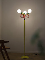 Retro Modern Memphis Style Geometric Floor Lamp with Colorful Accents and Rounded Glass Globe