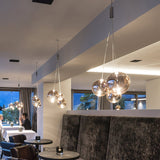 artistic-led-cluster-bubble-pendant-lamp-with-chrome-accents-and-glass-spheres