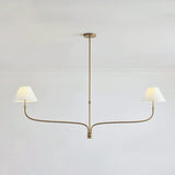 modern-antique-brass-chandelier-with-curved-arms-and-white-tapered-fabric-shades