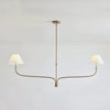 modern-antique-brass-chandelier-with-curved-arms-and-white-tapered-fabric-shades