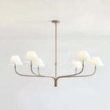 modern-antique-brass-chandelier-with-curved-arms-and-white-tapered-fabric-shades