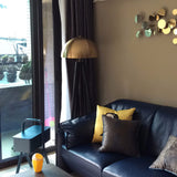 mid-century-modern-tripod-floor-lamp-with-dome-gold-metal-shade-and-black-legs