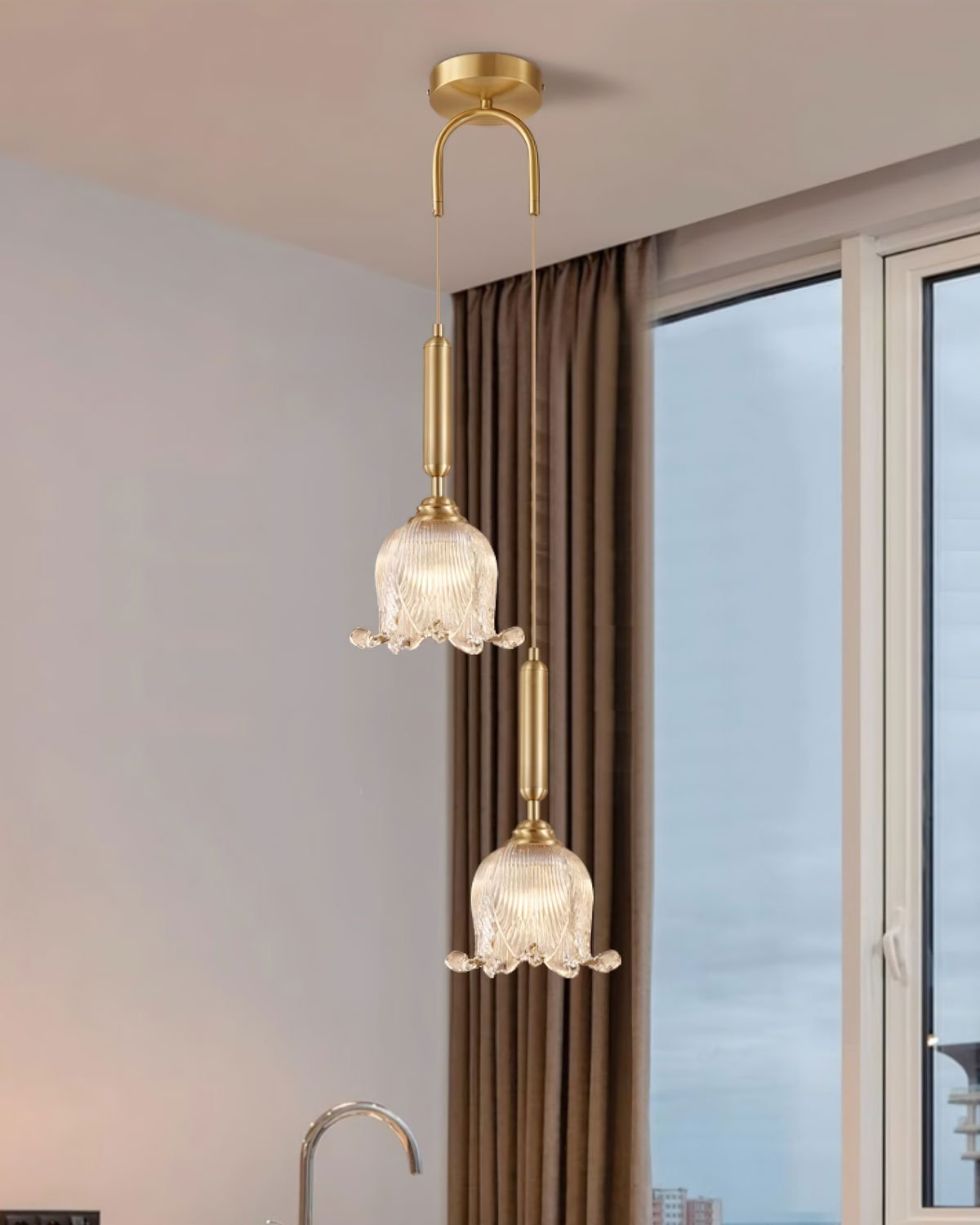 modern-brass-floral-pendant-light-with-clear-crystal-glass-shade-for-dining-areas