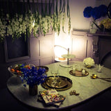 modern-asymmetrical-crescent-table-lamp-with-gold-interior-and-acrylic-globe