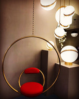 modern-asymmetrical-crescent-table-lamp-with-gold-interior-and-acrylic-globe