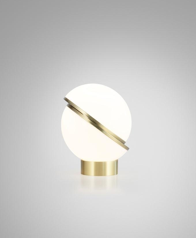 modern-asymmetrical-crescent-table-lamp-with-gold-interior-and-acrylic-globe