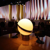 modern-asymmetrical-crescent-table-lamp-with-gold-interior-and-acrylic-globe