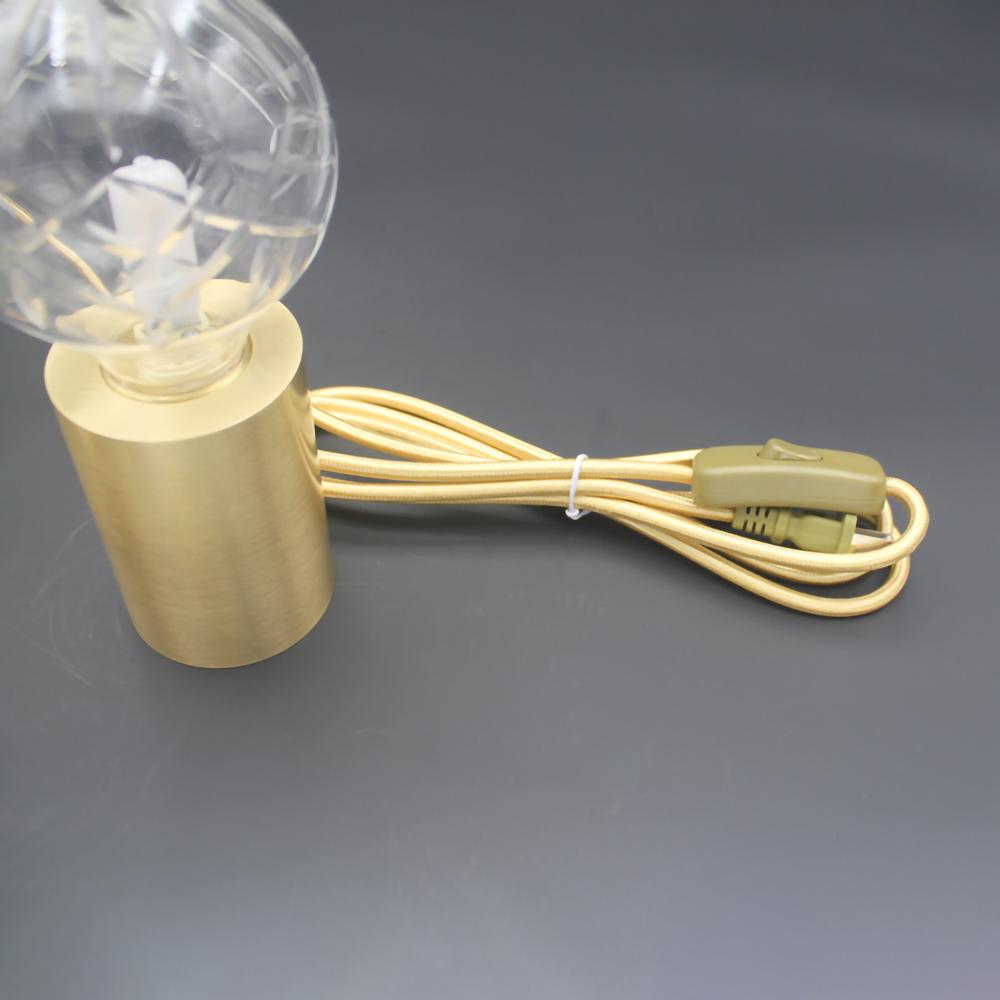 modern-crystal-glass-sphere-table-lamp-with-polished-brass-base-and-warm-led-glow