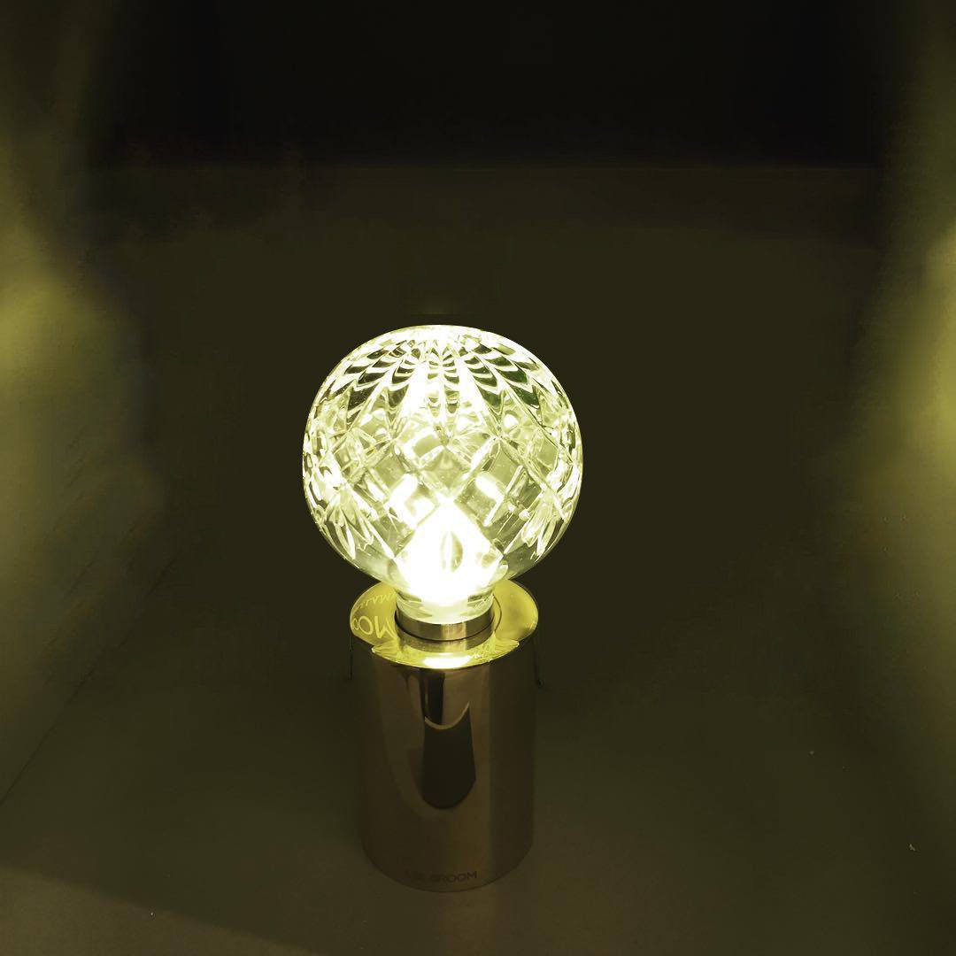 modern-crystal-glass-sphere-table-lamp-with-polished-brass-base-and-warm-led-glow