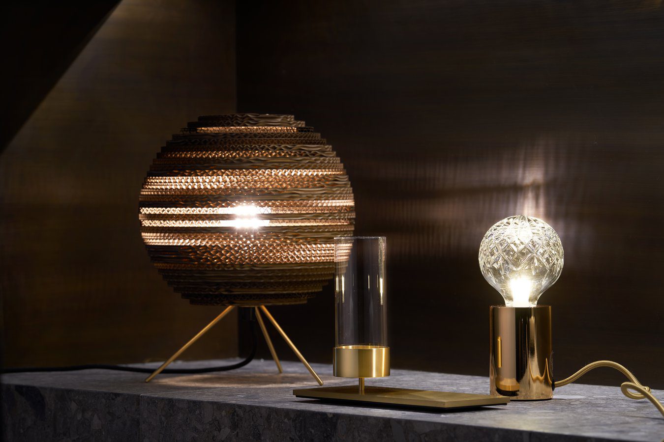 modern-crystal-glass-sphere-table-lamp-with-polished-brass-base-and-warm-led-glow