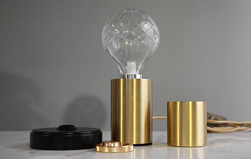 modern-crystal-glass-sphere-table-lamp-with-polished-brass-base-and-warm-led-glow