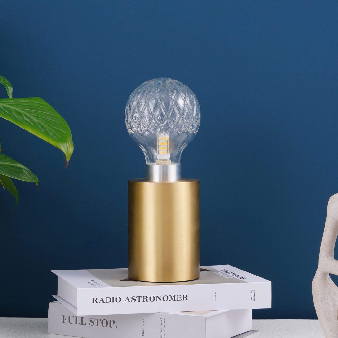modern-crystal-glass-sphere-table-lamp-with-polished-brass-base-and-warm-led-glow