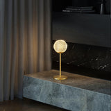 Elegant Crystal Globe Table Lamp with Polished Brass Finish and Spherical Shade