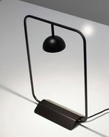 Modern Minimalist Cupolina Dome Table Lamp with Curved Metal Body for Reading and Office