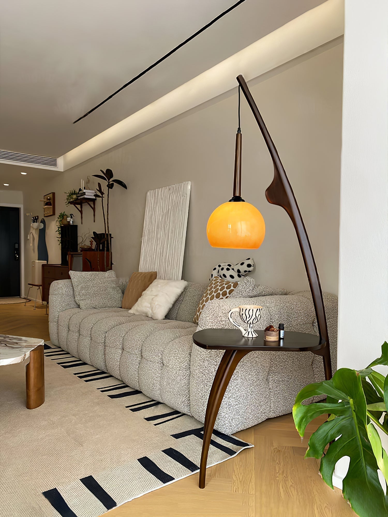 Modern Curved Mantis Wood Floor Lamp with Amber Glass Orb Shade for Living Room and Bedroom