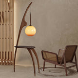 Modern Curved Mantis Wood Floor Lamp with Amber Glass Orb Shade for Living Room and Bedroom