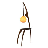 Modern Curved Mantis Wood Floor Lamp with Amber Glass Orb Shade for Living Room and Bedroom