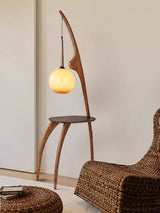 Modern Curved Mantis Wood Floor Lamp with Amber Glass Orb Shade for Living Room and Bedroom