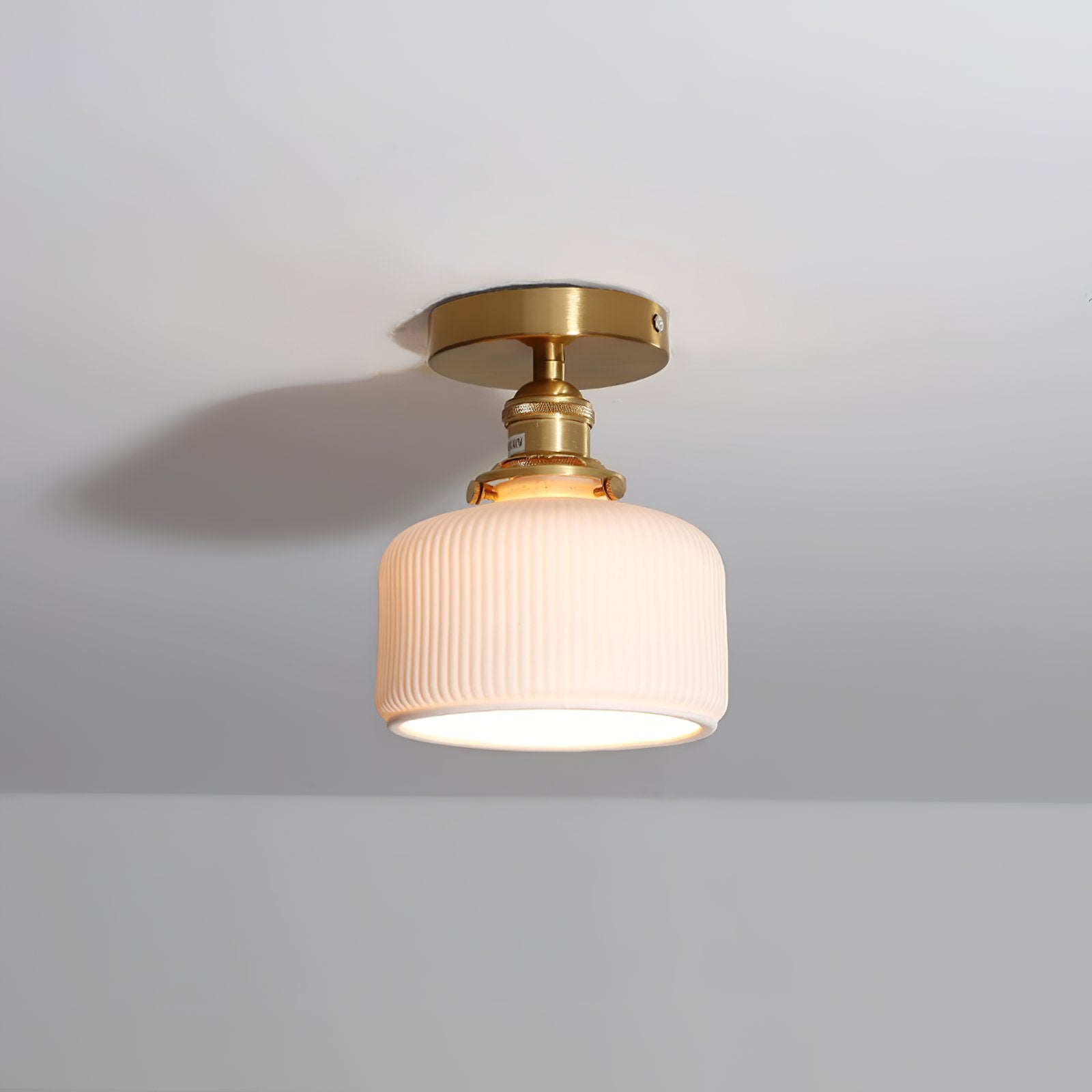 elegant-brass-and-white-ceramic-ceiling-lamp-flush-mount-lighting-fixture-for-modern-interiors