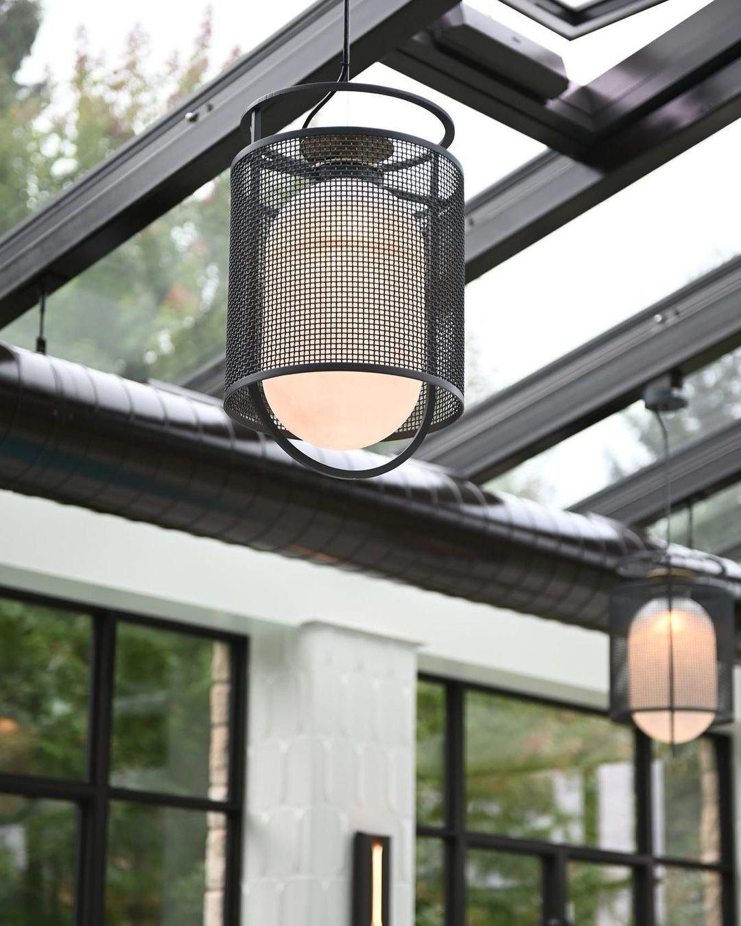 modern-industrial-black-cage-pendant-light-with-oval-fiberglass-shade-for-living-room