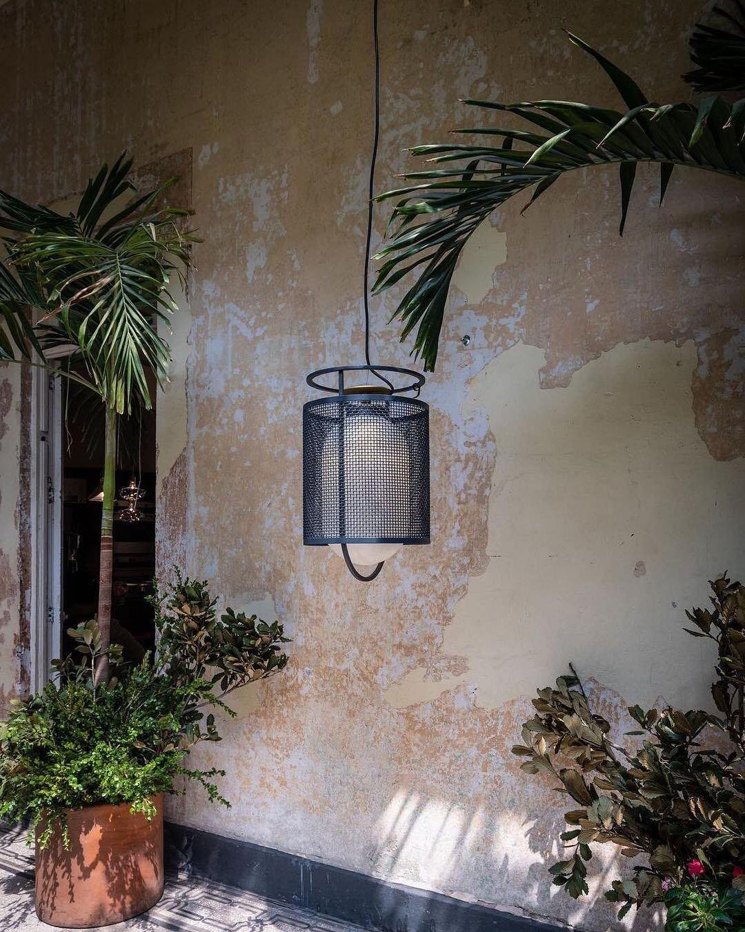 modern-industrial-black-cage-pendant-light-with-oval-fiberglass-shade-for-living-room