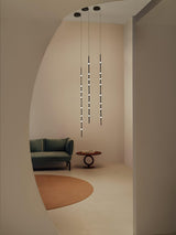dew-explores-modern-linear-led-pendant-light-with-organic-oval-points-for-stairwells