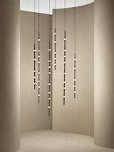 dew-explores-modern-linear-led-pendant-light-with-organic-oval-points-for-stairwells