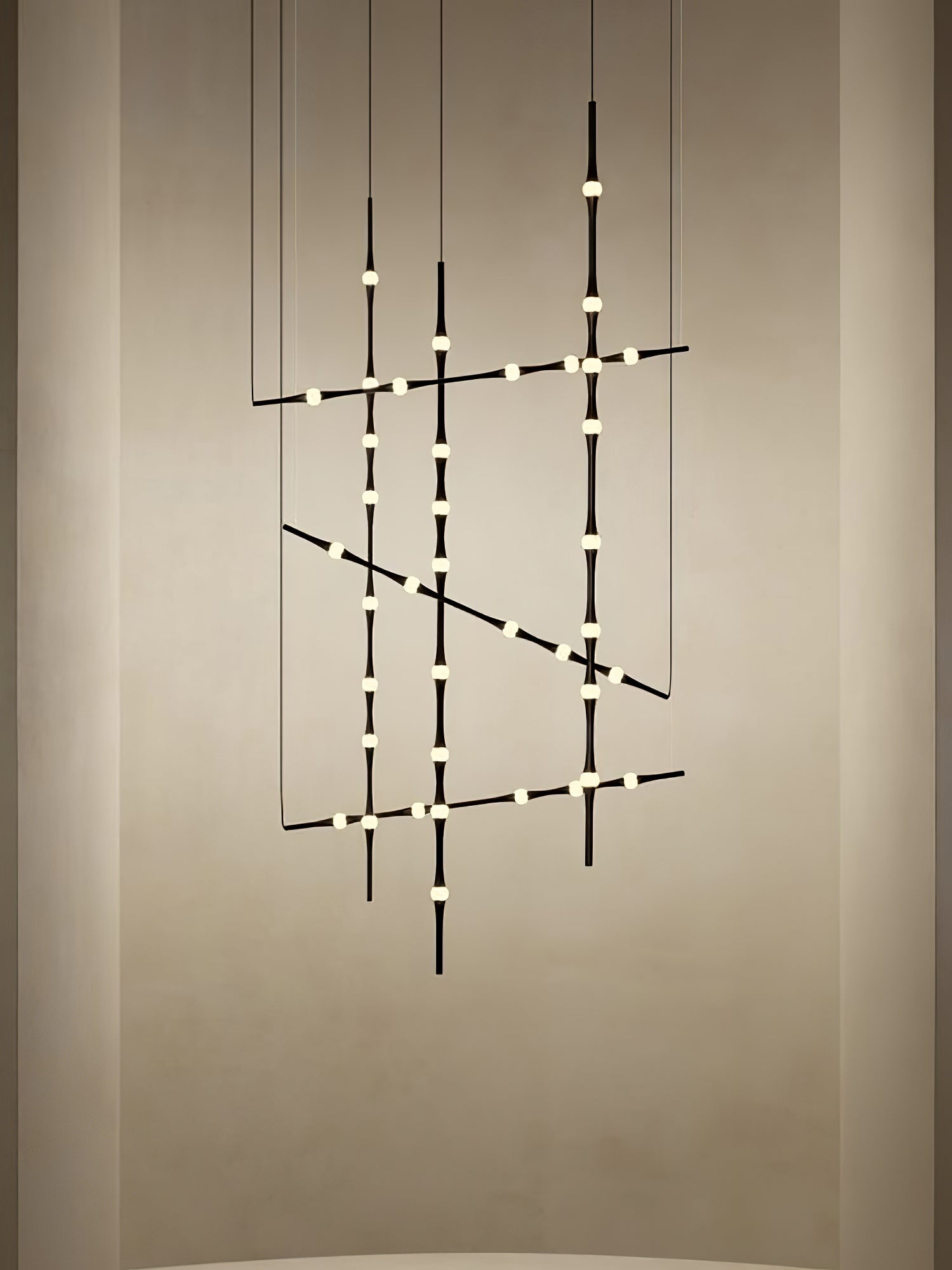 dew-explores-modern-linear-led-pendant-light-with-organic-oval-points-for-stairwells