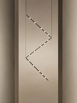 dew-explores-modern-linear-led-pendant-light-with-organic-oval-points-for-stairwells